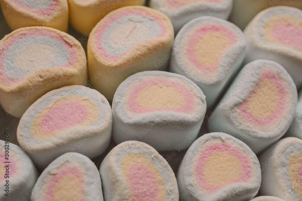 Colorful marshmallows candy as background. Close up view of fluffy candies. Colorful marshmallows candy as background. Close up view of fluffy candies.