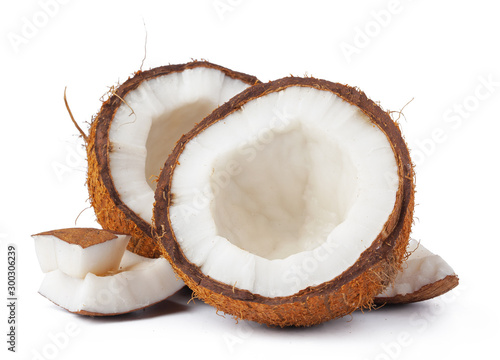 Pieces of a coconut on white background