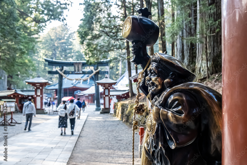 View of the gate of Nikko Futarasan jinja, a Mountain-top Shinto shrine with precinct and gardens, dating from the 8th century in Nikko, Tochigi, Japan
