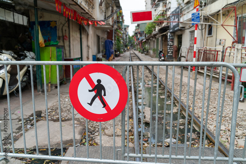 No walk sign on barrier at Hanoi railway
