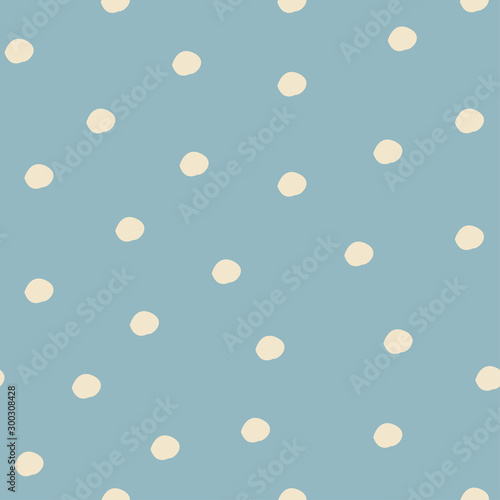 Seamless pattern with falling snowflakes and dots