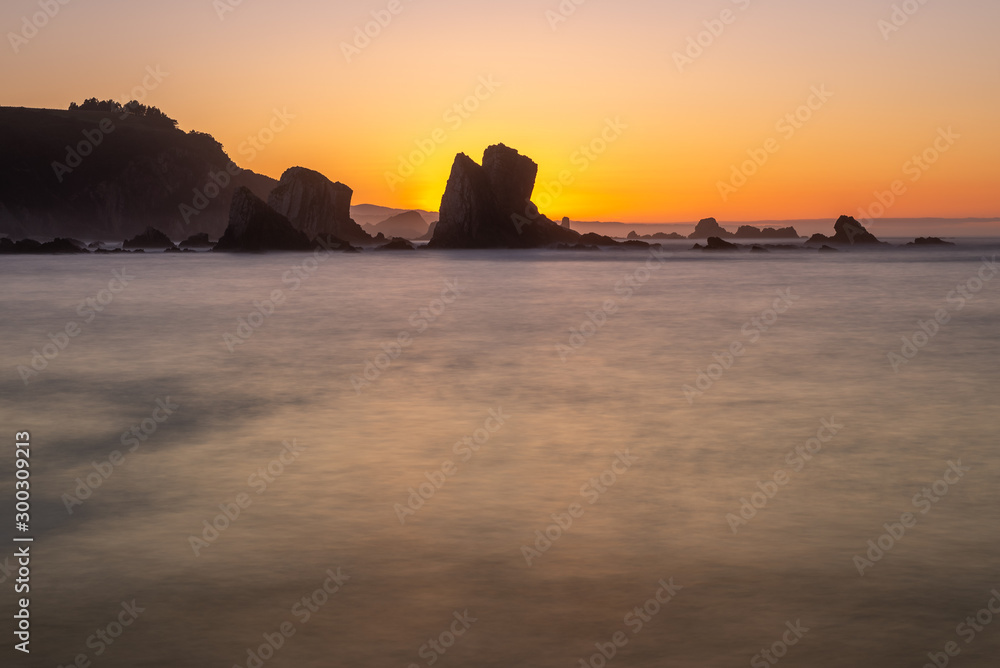 Playa del Silencio beach at sunset, Cudillero in Asturias, Spain