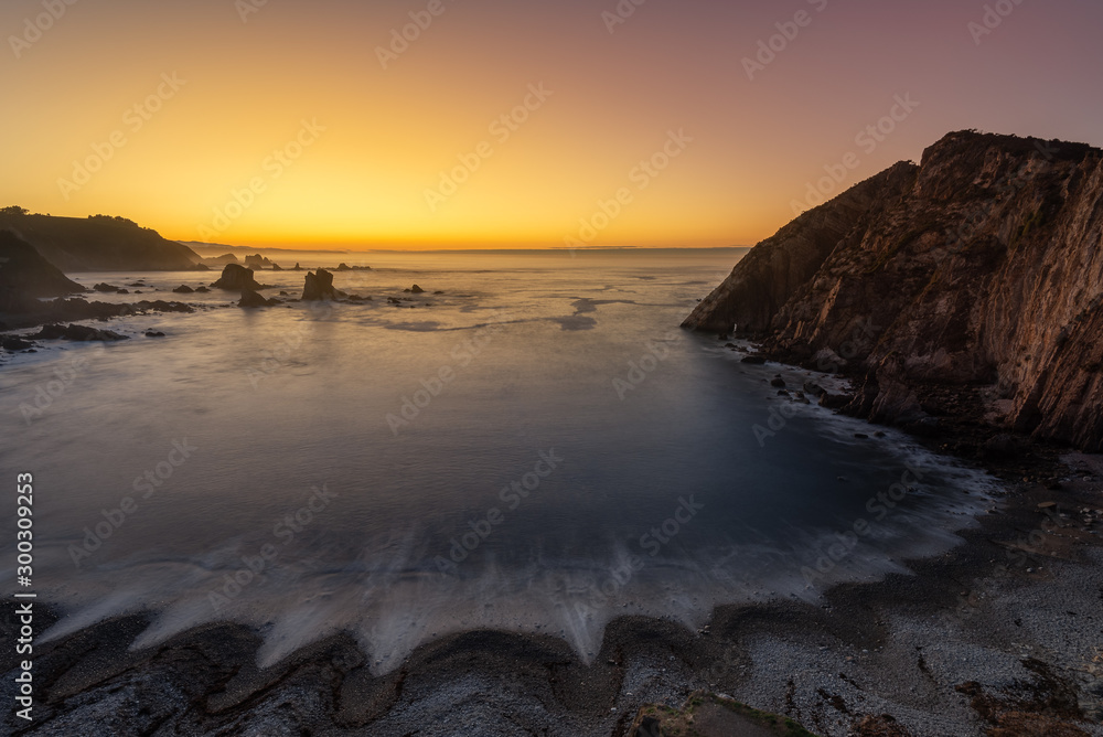 Fototapeta premium Playa del Silencio beach at sunset, Cudillero in Asturias, Spain