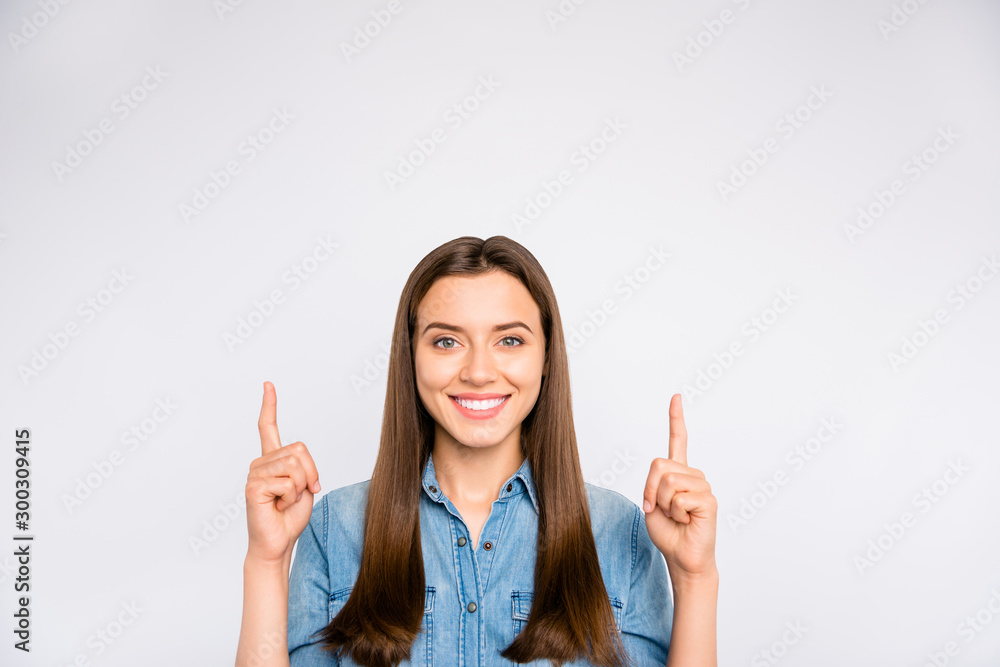 Close up photo of confident cool girl point index finger indicate news about sales discounts demonstrate ads wear denim jeans good looking outfit isolated over white color background Close up photo of confident cool girl point index finger indicate news about sales discounts demonstrate ads wear denim jeans good looking outfit isolated over white color background