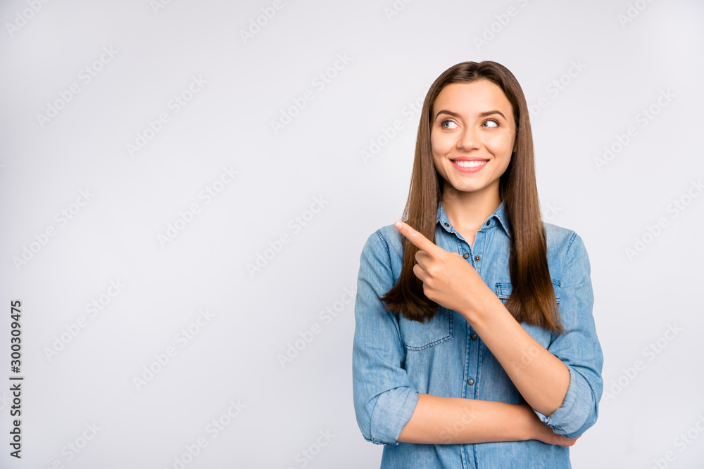 Portrait of confident cool promoter girl look adverts enjoy point index finger recommend suggest sales discounts wear casual style outfit isolated over white color background Portrait of confident cool promoter girl look adverts enjoy point index finger recommend suggest sales discounts wear casual style outfit isolated over white color background