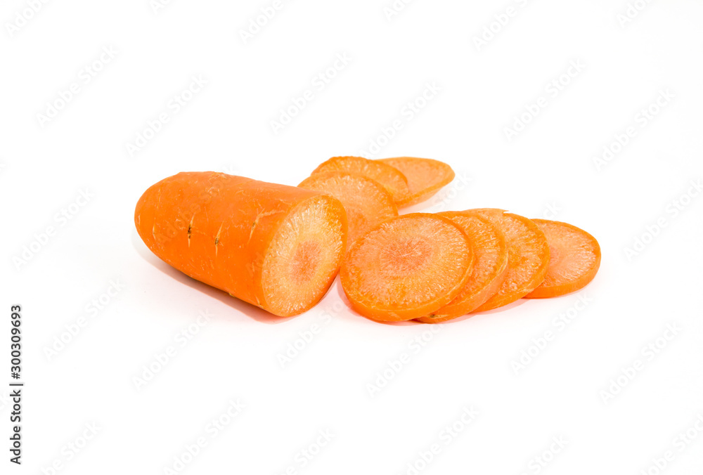 Close up carrot sliced into pieces with reflecting orange shadow on white background. Close up carrot sliced into pieces with reflecting orange shadow on white background.
