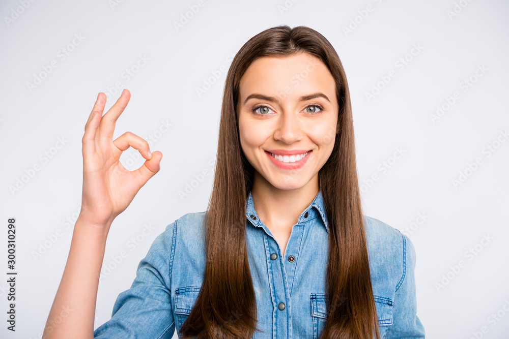 Close up photo of confident cool promoter girl show ok sign pick tips wear casual style clothes isolated over white color background Close up photo of confident cool promoter girl show ok sign pick tips wear casual style clothes isolated over white color background