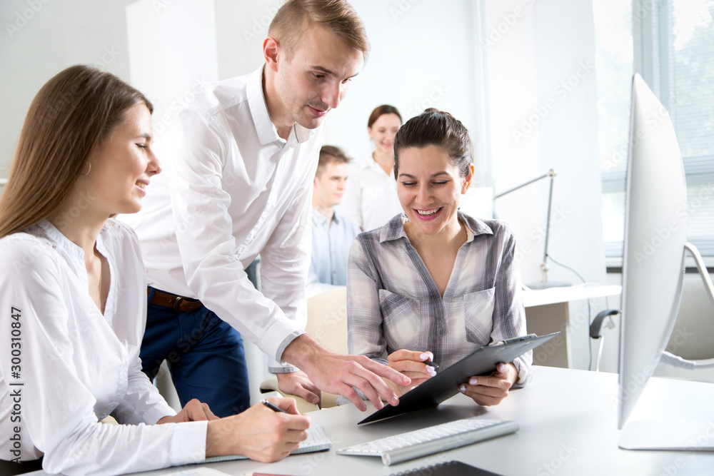 Business people working together in the office Business people working together in the office