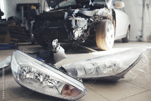 Headlights of the car on disassembly, close-up.