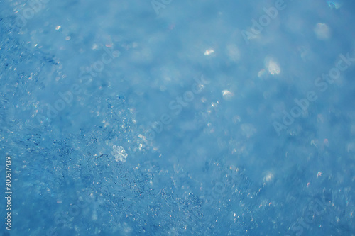 Snow close up. The concept of frost, cooling. Abstract light winter background image. Macro photo.