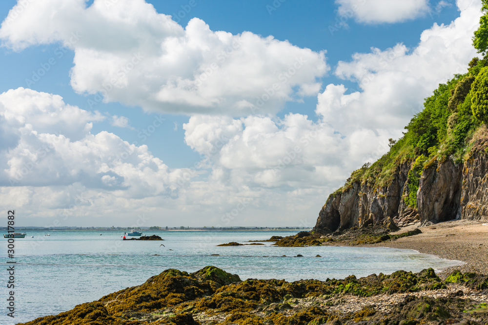 Hiking in Brittany, France on a beautiful summer day. A coastal path around the 