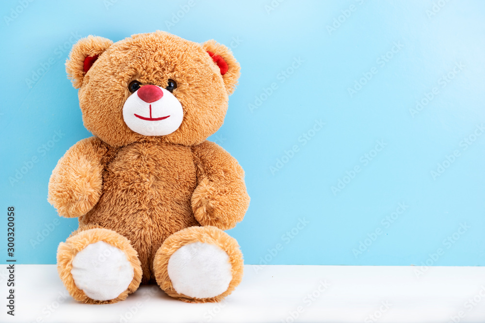 Φωτογραφία Teddy bear with blood sugar meter on blue background with space to copy; concept of diabetes in children; children's medicine; treatment of diabetes in children