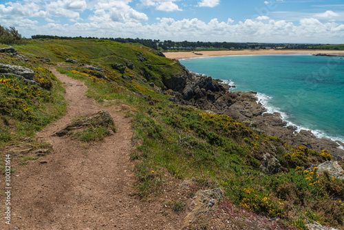 Hiking in Brittany, France on a beautiful summer day. A coastal path around the 