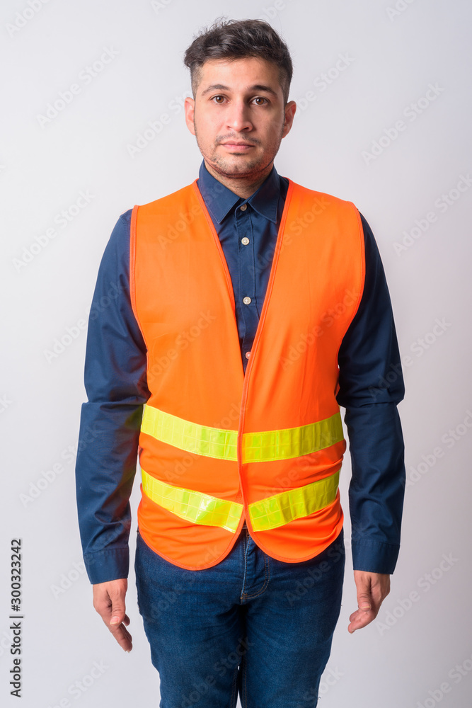 Fototapeta premium Portrait of young Persian man construction worker