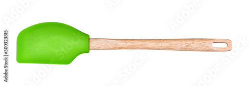 Silicone kitchen spatula with wooden handle for the dough on an isolated white background