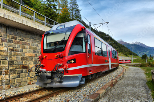  Bernina Express train in the mountains of Switzerlandm