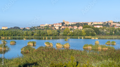 Prao de la Paul lake with Laguardia town as background, Rioja Alavesa, Spain
