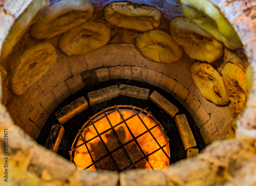 Puri Tandoor oven bread making in a bakery of Ninotsminda Samtskhe Javakheti region Georgia eastern Europe photo