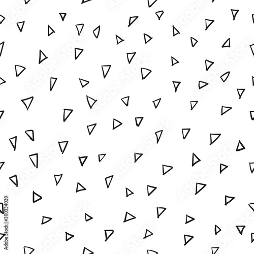 Vector seamless pattern with black hand drawn triangles on white background. Seamless pattern can be used for textile, wallpaper, wrapping paper, web
