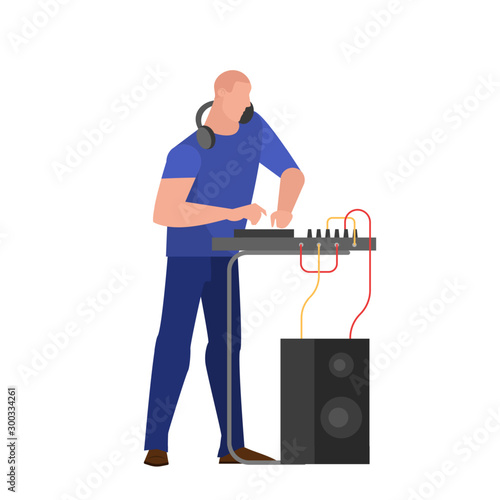 DJ person standing at the audio console