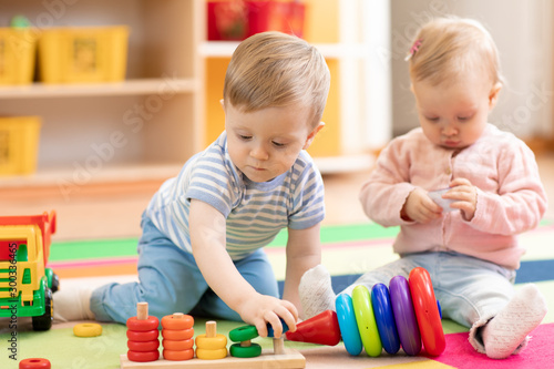 Nursery babies playing with...