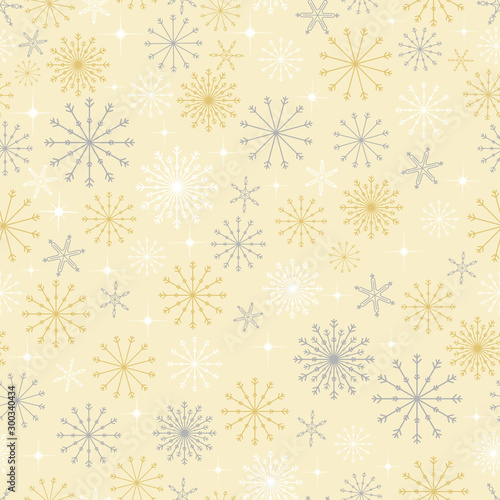 Seamless pattern cold Winter in Christmas Day with Cute cartoon snowflakes in different size in silver and yellow gold on yellow background,Vector seamless for wrapping paper or fabric