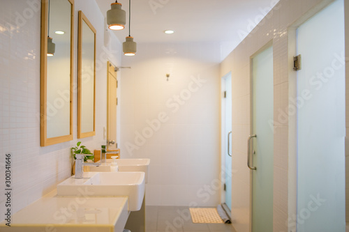 public lavatory wash and Toilet bowl in modern bathroom interior