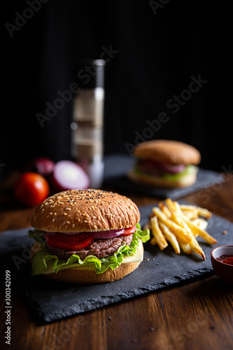 classic burger with fries, vertical