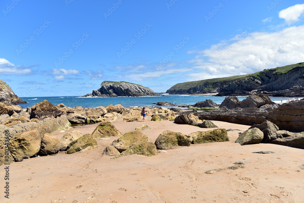 Big rocks on the beach of Playa Arnia,  Liencres, Cantabria, Spain 
