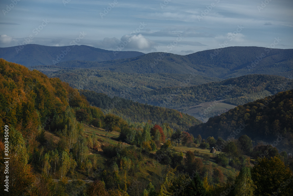 autumn mountains with haze of rising clouds autumn mountains with haze of rising clouds