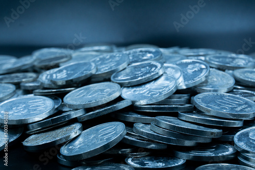 Close up of coins to stack of coins, Business Growth concept, There is money coins to stack of coins. Financial risk.
