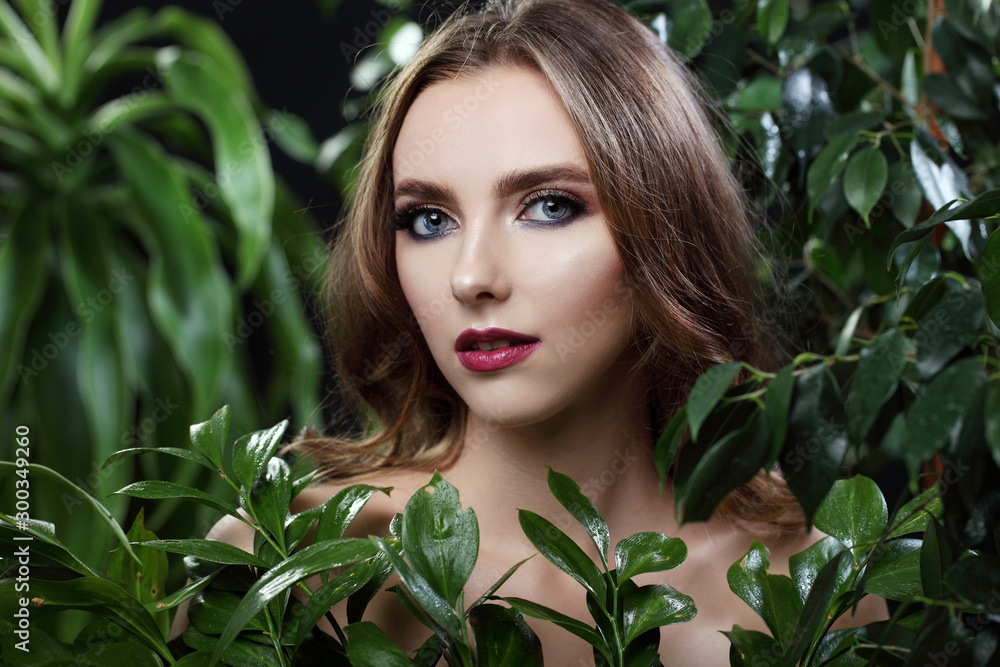 Beautiful girl with leaflets. Face closeup Makeup. Beautiful girl with leaflets. Face closeup Makeup.