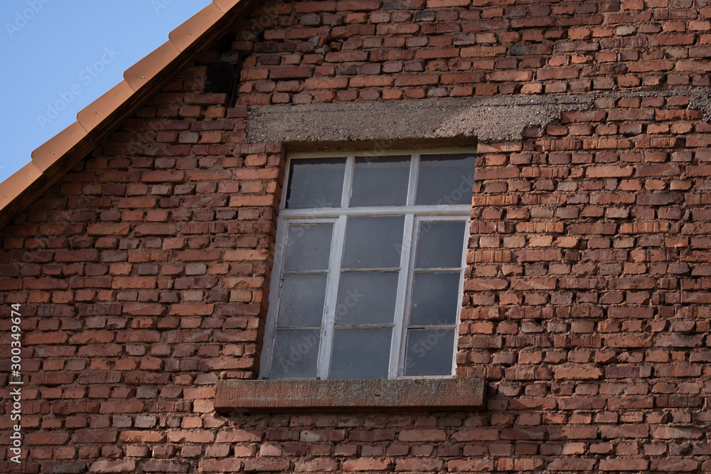 Detail of brick wall building , old window