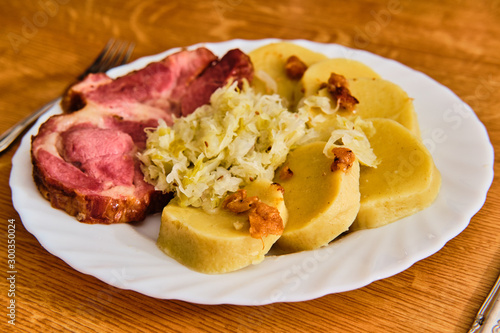 Czech smoked meat with gabbagge and potato dumplings