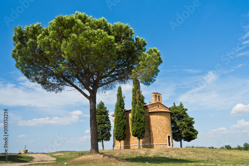 Famous chapel Cappella Madonna di Vitaleta near Pienza, Siena province, Tuscany, Italy photo