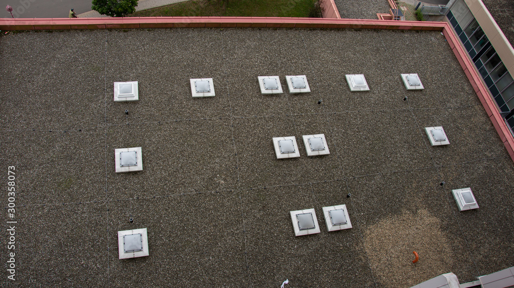 Fototapeta premium Aerial top view of industrial technical system machines on the rooftop in Germany, Pirmasens,, 2019