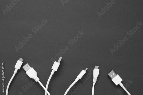 Close up the Smart Phone Charger Cable on black Background. copy space