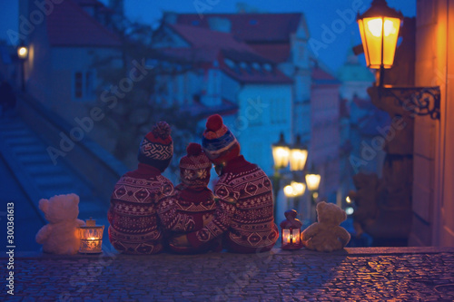 Photography Beautiful children, three boy brothers, casually dressed, looking at night view