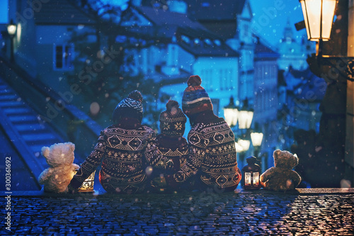 Photography Beautiful children, three boy brothers, casually dressed, looking at night view