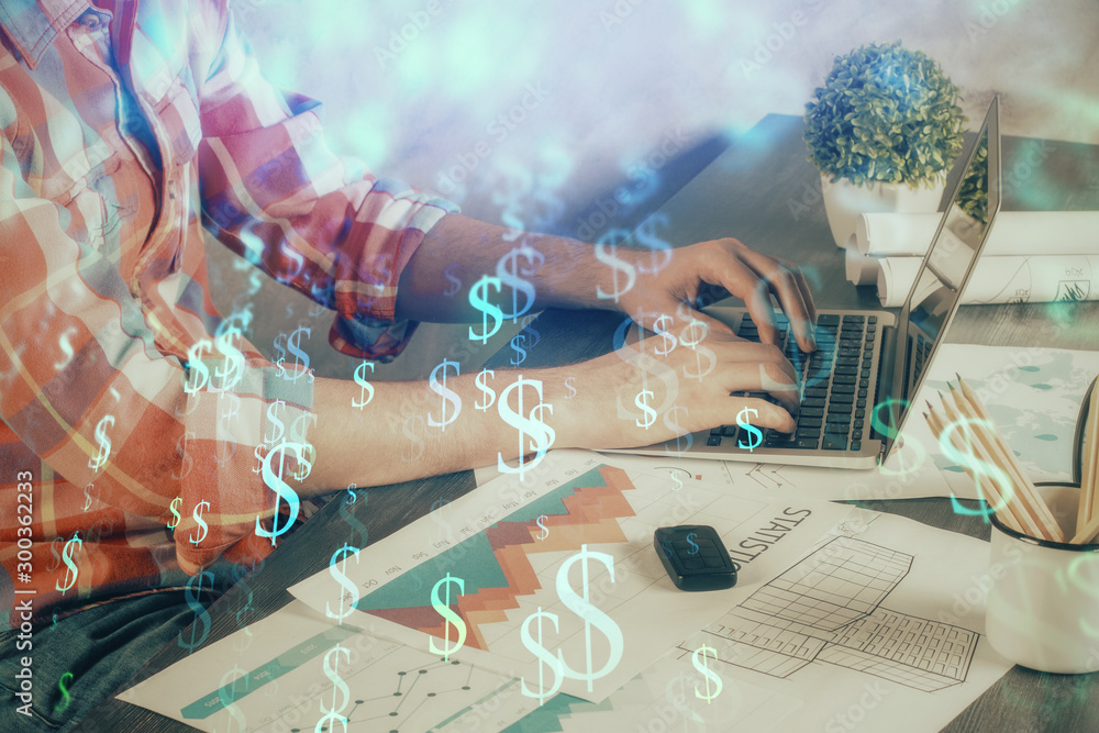 Double exposure of stock graph with businessman typing on computer in office on background. Concept of hard work. Double exposure of stock graph with businessman typing on computer in office on background. Concept of hard work.