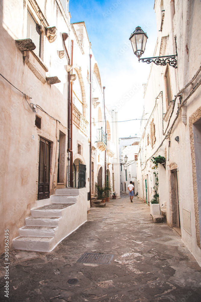 narrow street in old town – Streets and doors of Puglia, Italy 