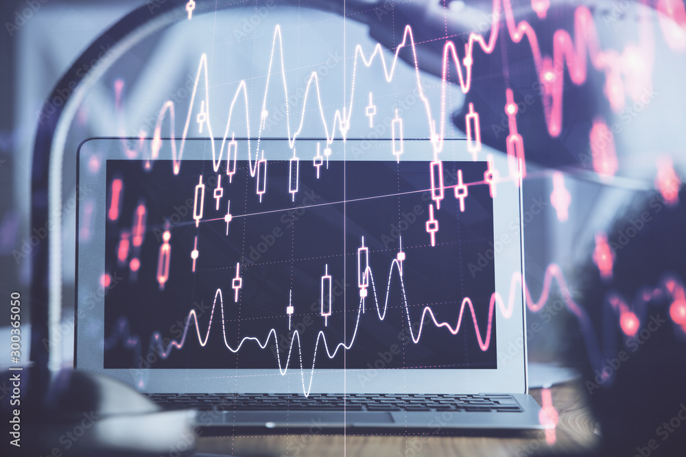 Obraz premium Stock market graph and table with computer background. Double exposure. Concept of financial analysis.