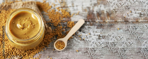 Mustard in a jar. Mustard Seeds Vegan concept. Healthy diet. Selective focus. Macro.