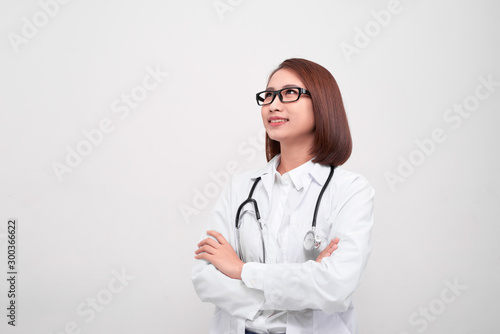 A young doctor on the white background