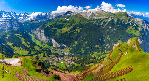 Mountain range Breithorn of Pennine Alps and Lauterbrunnen valley in Swiss Alps, Switzerland as seen from Klein Matterhorn, Switzerland. photo