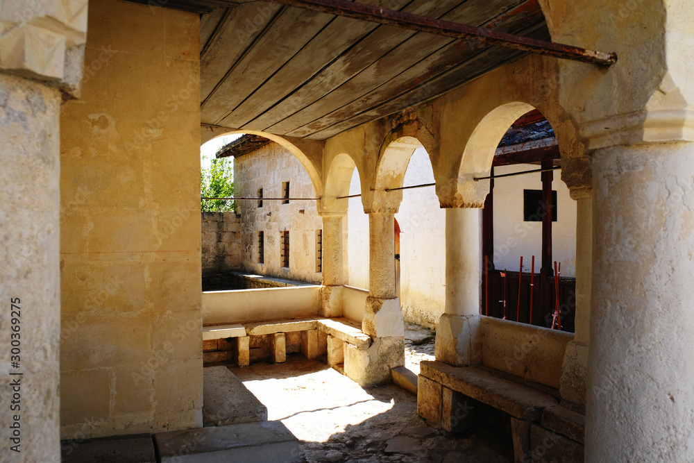 Fototapeta premium Karaites kenassas. Ancient building in the cave town of Chufut-Kale, Crimea.