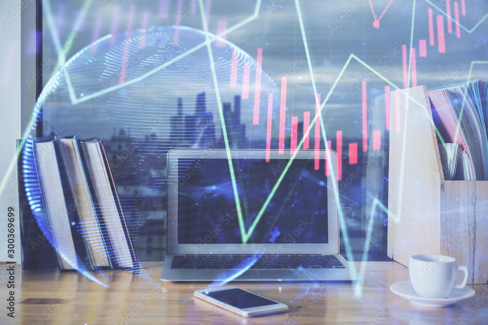Financial market graph hologram and personal computer on background. Double exposure. Concept of forex. Financial market graph hologram and personal computer on background. Double exposure. Concept of forex.