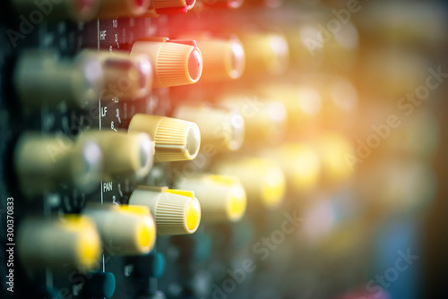 Bild auf Leinwand Light and color on the sound system control panel.