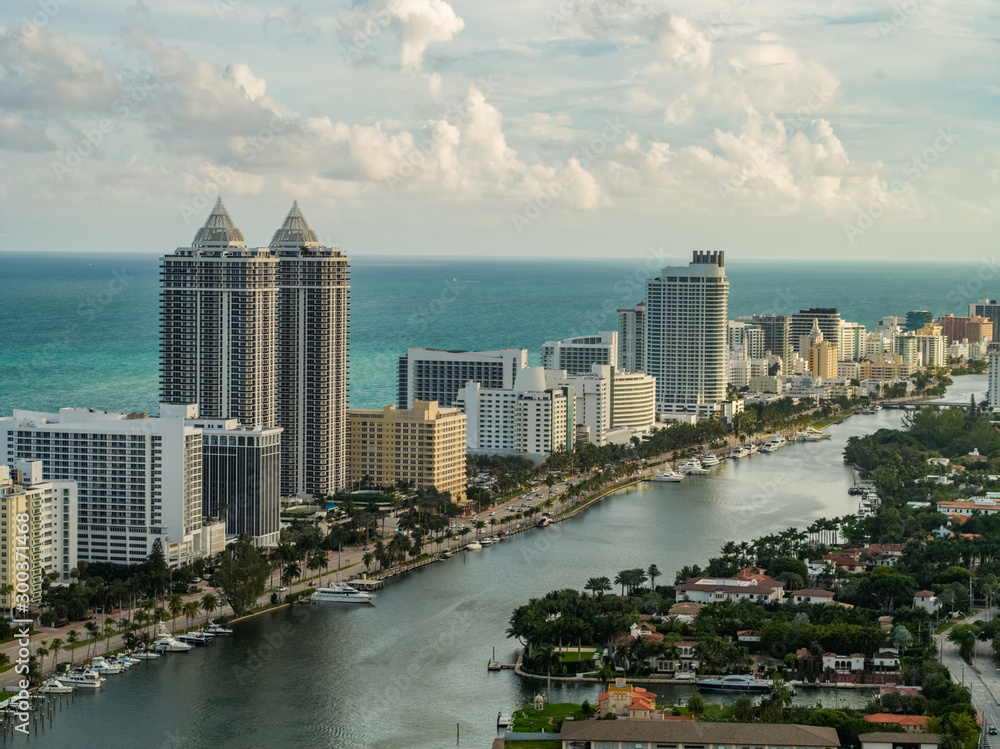 Fototapeta premium Aerial photo Miami Beach condominium architecture including indian creek collins avenue