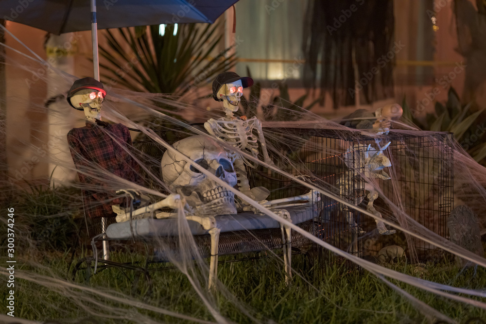 Skeletons and spider webs Halloween holiday night